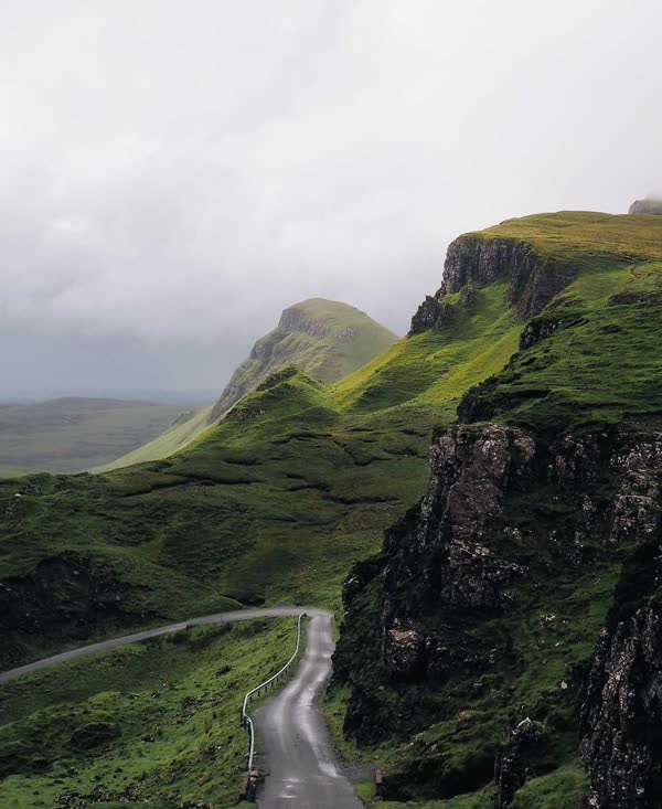 Green hills and a winding road