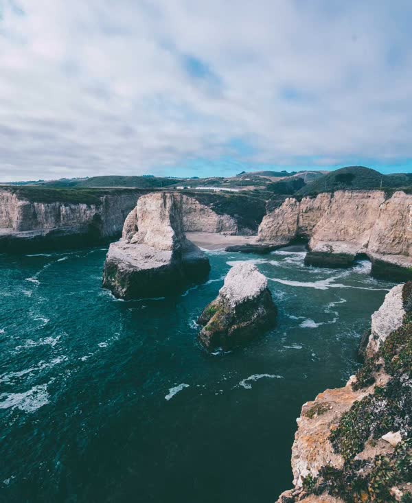Sea cliffs under a blue sky